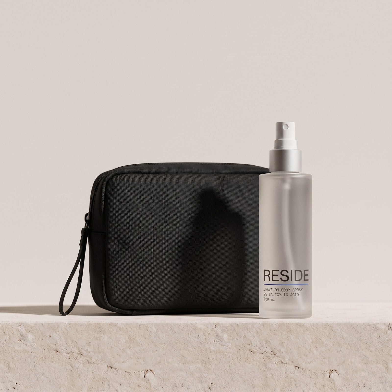 Reside Body Acne Spray with the free Reside pouch